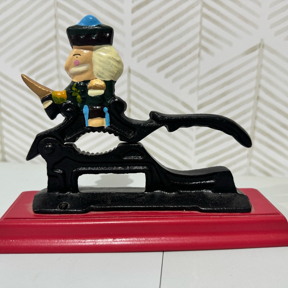 VTG Hand painted Cast Iron Soldier Christmas NUTCRACKER on Red Wood Base